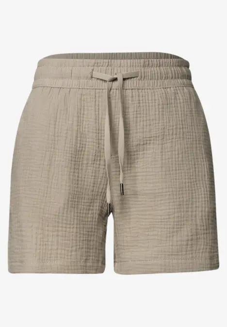 Beige, locker sitzende Shorts aus leichtem, texturiertem Stoff mit elastischem Bund und Kordelzug