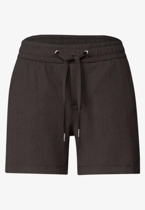 Schwarze Baumwoll-Shorts mit elastischem Tunnelzugbund und seitlichen Taschen.