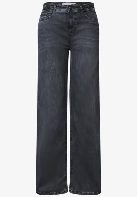 Jean gris foncé à taille médiane, coupe droite et jambe ample.