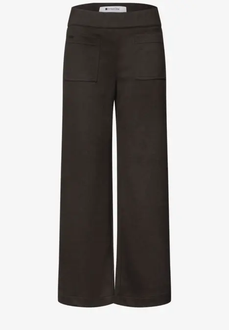 Pantalon noir large, coupe droite et taille haute.