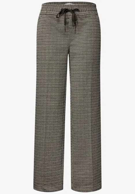 Gerade Stoffhose mit elastischem Bund, Kordelzug und dezentem Allover-Muster.