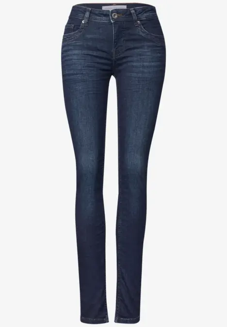 Jean skinny bleu foncé pour femme, cinq poches, fermeture par bouton et braguette, coupe ajustée.
