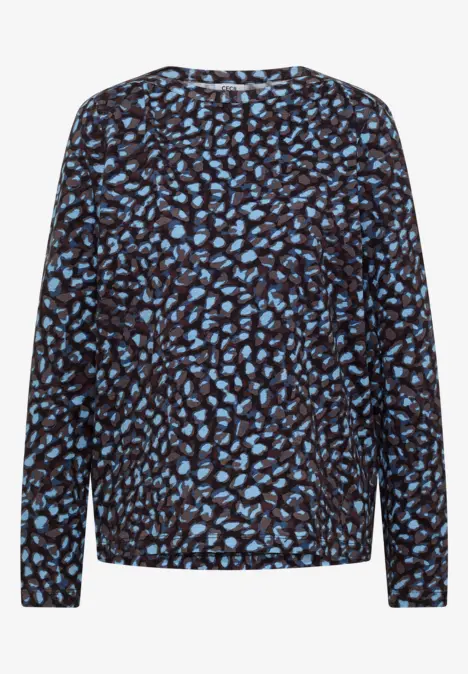 Pull noir à motif de feuilles bleues, manches longues et col rond.