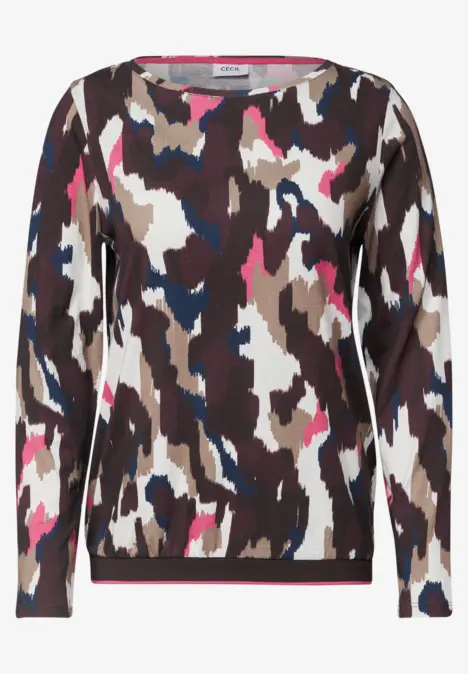 Langärmliges Damenoberteil mit buntem Camouflage-Muster in Braun, Weiß, Blau und Pink.