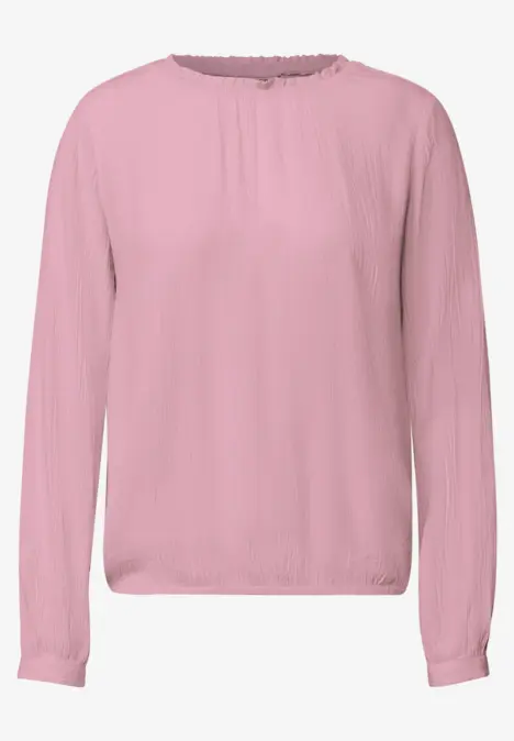rosa Bluse mit langen Ärmeln, rundem Ausschnitt und schlichtem Design