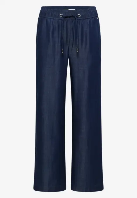 Pantalon en jean bleu foncé à coupe large, taille élastique avec cordon.