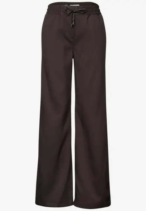 Pantalon lounge noir, coupe ample, taille élastique avec cordon.