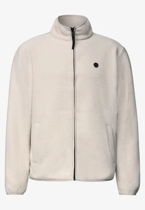 Veste polaire blanche zippée, col montant, poches latérales et petit logo rond sur la poitrine.
