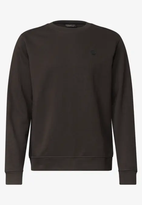 Pull col rond uni de couleur sombre, manches longues et poignets côtelés.