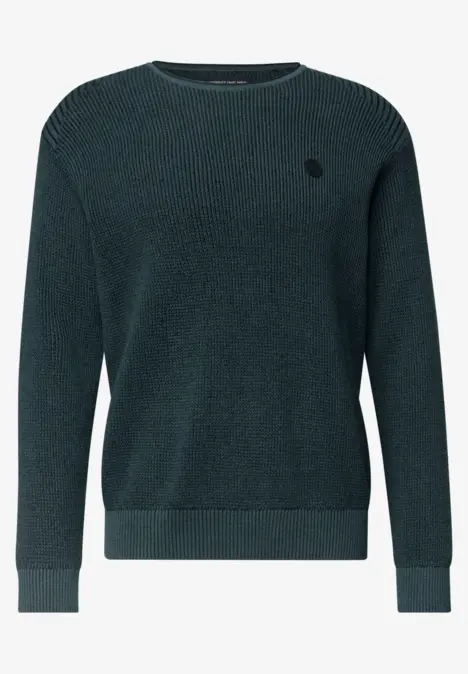 Pull en maille vert foncé avec encolure ronde, manches longues et petit logo brodé sur la poitrine.