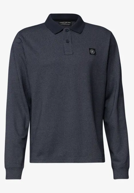 Dunkelblaues Langarm-Polohemd mit Baumwollpiqué, klassischem Kragen, Knopfleiste und kleinem Brustlogo.