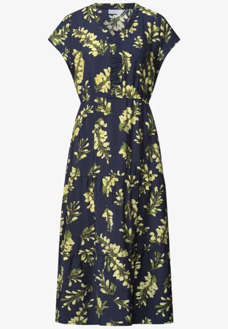 Robe midi bleu marine à encolure V, manches courtes, taille cintrée et motif de feuilles vertes