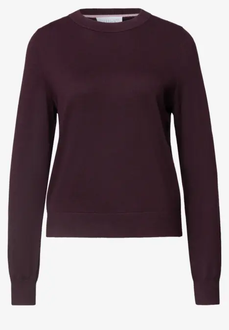 Pull col rond bordeaux à manches longues au design épuré.