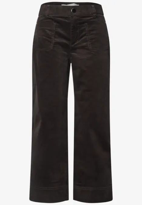 Pantalon en velours côtelé marron foncé, taille haute et coupe large.