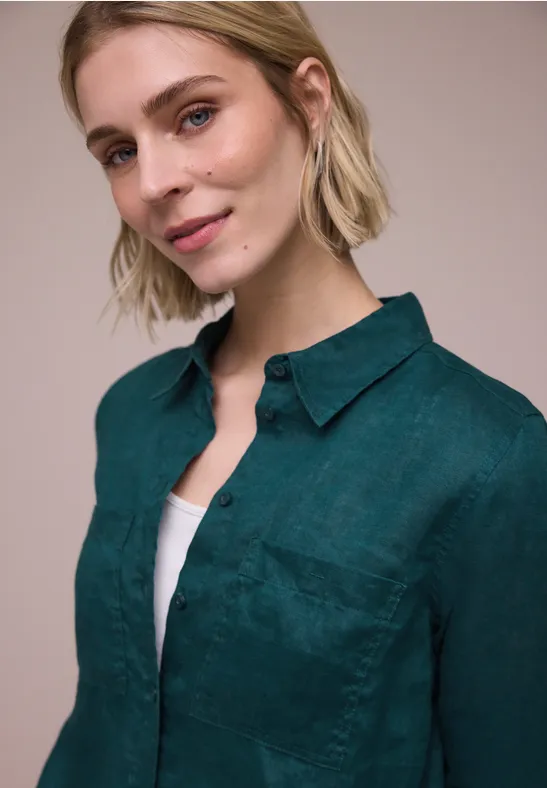 Blouse à manches longues avec poches sur la poitrine