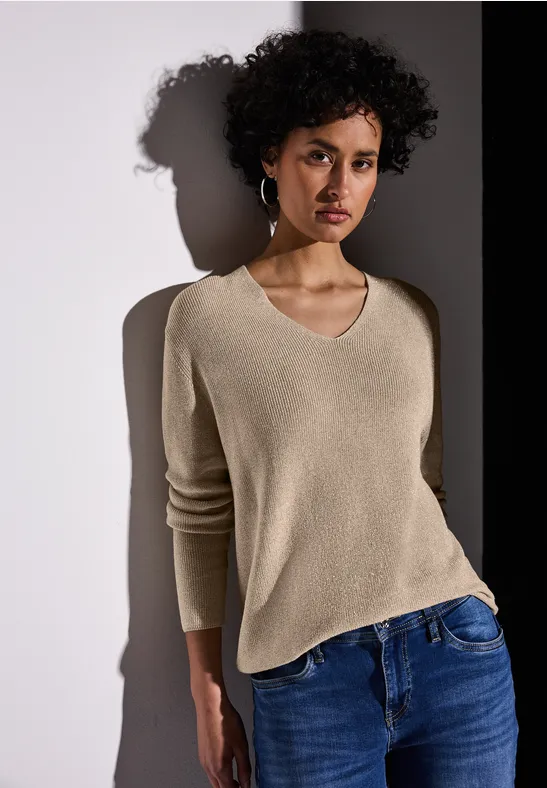 Glitzernder Pullover