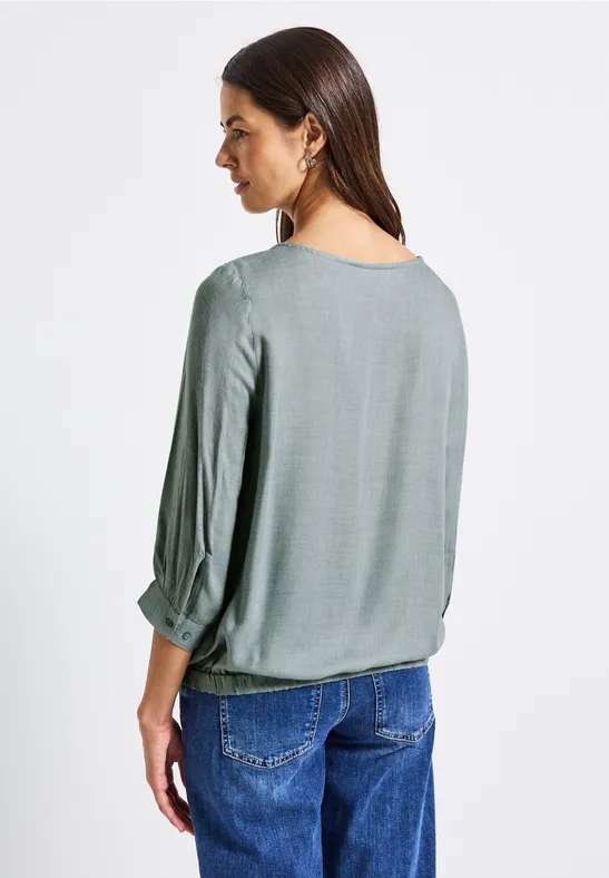 Chemise en jersey à col fendu pour femmes en Blanc